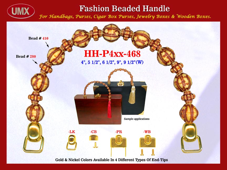 The wholesale cigarbox purse handles are fashioned from mixed wholesale spacer beads and wholesale Bali beads.